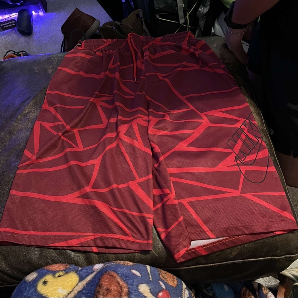 Boys red Nike shorts